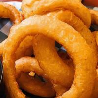 Onion Rings · Thick-cut beer-battered onion rings served with remoulade.