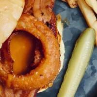 Cowboy Burger · 8oz fresh sirloin cooked to your liking, topped with cheddar, bacon, an onion ring, lettuce,...