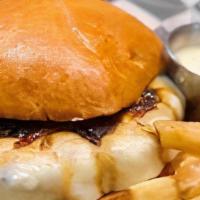 Pub Burger · 8oz fresh sirloin cooked to your liking, topped with provolone, balsamic-onion jam, pub sauc...