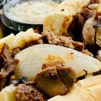 Cheesesteak · Philly-style beef, caramelized onions, sautéed mushrooms, and choice of American, Provolone,...