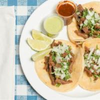Ground Beef Tacos (3 Pcs.) · Comes with onions and cilantro.