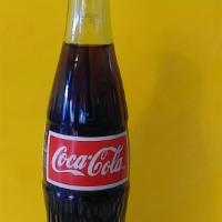 Mexican Coca Cola · 12 fl.
