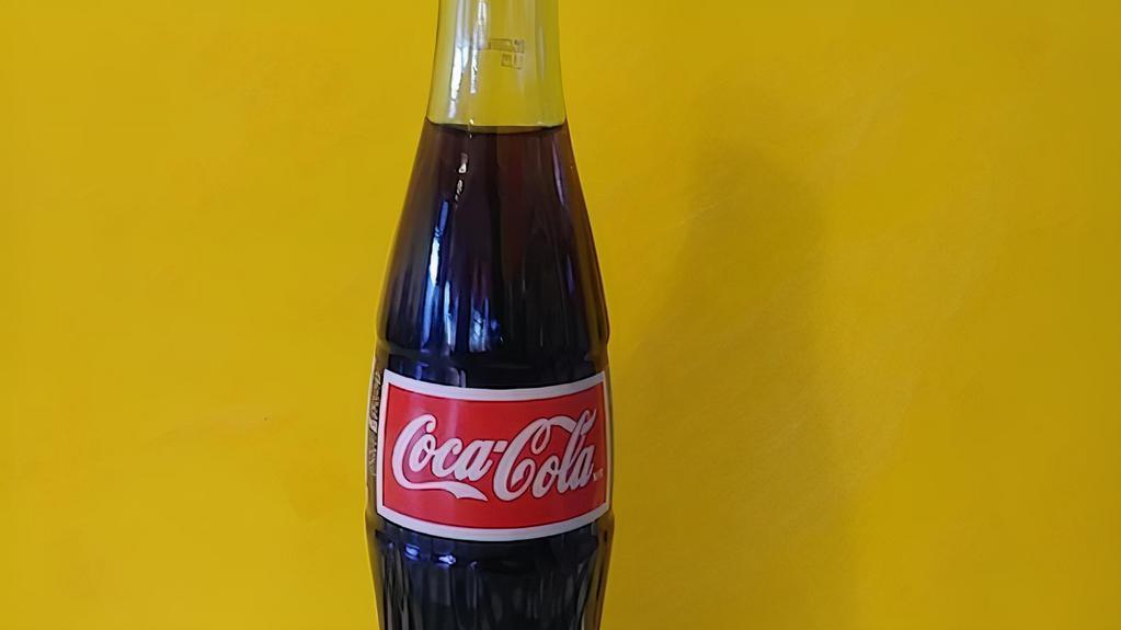 Mexican Coca Cola · 12 fl.