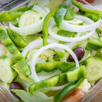 Garden Salad · Iceberg lettuce, fresh romaine lettuce, red onions, cucumbers, tomatoes, onions, green peppe...