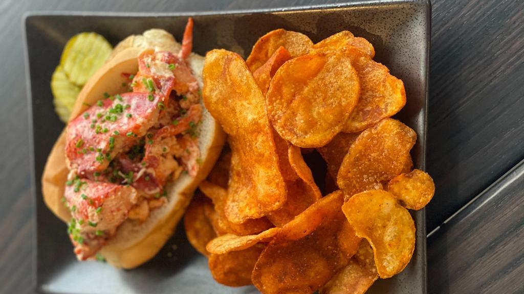 Lobster Roll · New England style, chives, lemon, homemade chips.