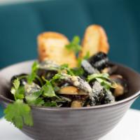 Braised Mussels · coconut curry cilantro broth