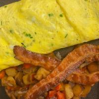 Farmer'S Garden Omelette · mushrooms, onions, peppers, spinach, tomato, hash browns and bacon