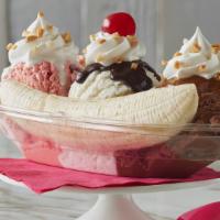 Banana Split · Choose any 3 favors of your favorite ice creams. Top with your choice of toppings with a ban...