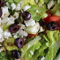 Greek Salad · Spring Mix, Feta, Olives, Tomatoes, Roasted Peppers, & Red Onion