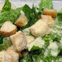 Caesar Salad · Crispy romaine tossed with creamy Caesar dressing, Parmesan cheese and croutons.