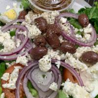 Greek Salad · Mixed greens with tomato, cucumbers, red onion, hard boiled egg and green peppers. Topped wi...