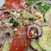 The Villager Salad · Just like the Old Country! No Lettuce! Large portion of tomatoes, cucumbers, red onions, gre...