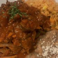 Bistec A La Mexicana / Mexican Steak · Filete sazonado con jalapeños, cebolla y tomate. Servido frijoles pintos, aguacate y queso f...