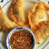 Thai Gyoza · Fried dumplings of chicken, pork & shrimp; ginger/soy dipping sauce