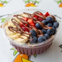 The Brookline · Pure Acai base topped with bananas, strawberries, blueberries, granola, and nutella drizzle