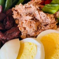 Tuna Nicoise Salad  · Tuna Salad, spring mix,  green beans, hard boiled egg, peppers, olives, tomatoes & French dr...