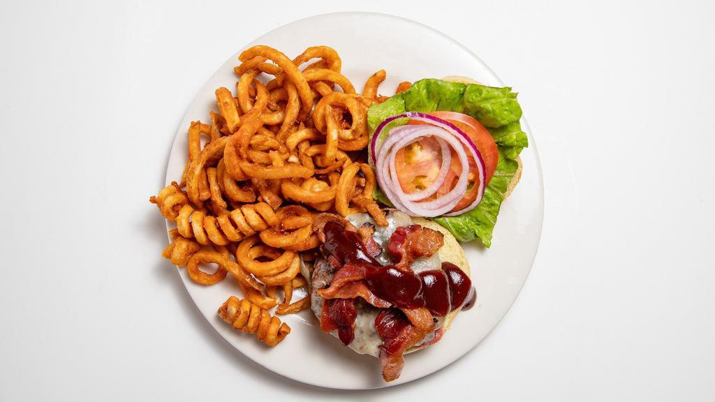 Smokehouse Burger · bacon, melted cheddar, BBQ sauce, crispy onions, lettuce, tomato & onion