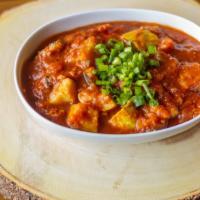 Chickpea Chili · Chickpeas cooked with mild Indian spices.