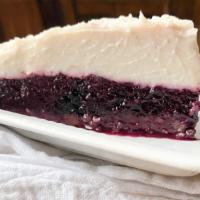 Young Coconut Berry Cream Pie · Young coconut cream with a berry bottom over a date nut crust.
