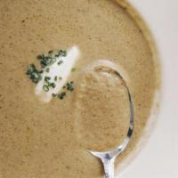 Kennett Square Mushroom Soup · Snipped chives and truffle crème fraiche. (D,G)