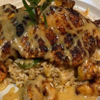 Blackened Chicken, Shrimp & Scallops · Over Dirty Rice With Honey & Creole Mustard.