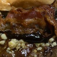 Johnny Cash Burger · Bacon blue cheese and voodoo sauce.