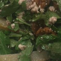 Mixed Greens · With Poached Apples, Blue Cheese, Toasted Walnuts & Raspberry Vinaigrette.