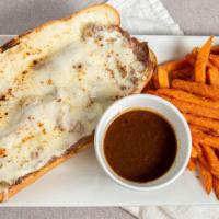 Prime Rib French Dip · Shaved prime rib topped with provolone cheese on a fresh Italian roll toasted to perfection ...