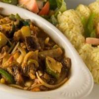 Vegetarian Curry · Eggplant, zucchini, tomatoes, onions. cooked in special curry sauce served over rice or inje...