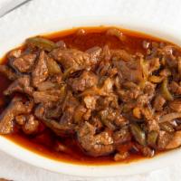 Cafe Special · strips of tender beef saute' d with onion and green pepper ,garlic and spicy sauce served wi...