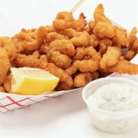 Fried Clam Strip · Premium juicy clam strips lightly battered and fried. Large size. Served with tartar sauce a...