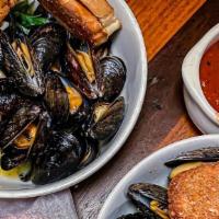 Mussels · With garlic butter or marinara.