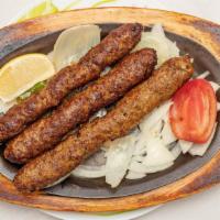 Seekh Kabab Tandoori · Minced meat(beef) / Chicken marinated with spice and herbs barbecued in charcoal clay-oven