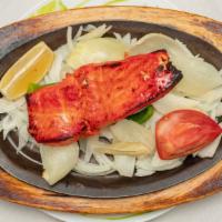 Fish Kabab Tandoori · Fillet of salmon marinated in chef’s special Tandoori spices cooked in clay-oven.
