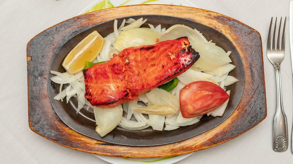Fish Kabab Tandoori · Fillet of salmon marinated in chef’s special Tandoori spices cooked in clay-oven.
