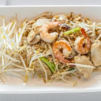 Pad Thai Noodles (Country Style) Bundle · Hot & spicy. An authentic spicy version of pad Thai, stir fried with egg, shrimp, chicken, s...