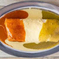 Cinco De Mayo Burrito · Filled with choice of meat, rice, beans, avocado salsa, pico de gallo, guacamole, cheese, an...