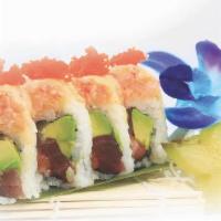 Ocean Roll (8 Pcs) · Tuna, salmon and avocado inside, topped with lobster salad and tobiko. Served with miso sauce.