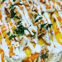 1311 Buffalo Chicken Nachos · Nachos and cheese served with shredded chicken breast tossed in hot sauce drizzled with chip...