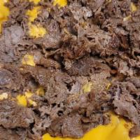 Philly Nachos · nachos & cheese topped with steak meat