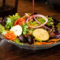 Side Salad · spring mix, tomatoes, red onion, shredded carrots, black olives, cucumbers, mozzarella chees...
