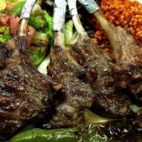 Lamb Chops · Grilled to perfection, served with bulgur, Antep salad and sautéed vegetables.