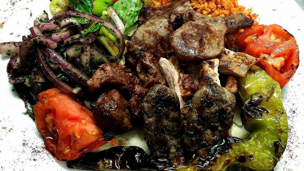 Isot Mix (4 People) · Combination of lamb chop, beef kebab, lamb kebab, grilled chicken thighs, kasap kofte, Adana kebab.