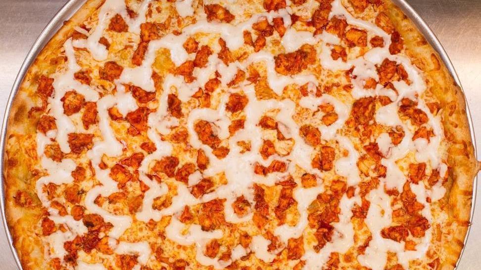 Buffalo Chicken Pizza · Our buffalo sauce topped with buffalo chicken and drizzled with ranch dressing.