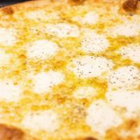 Quattro · A four cheese blend of asiago, mozzarella, ricotta, Parmigiano Reggiano and roasted garlic.
