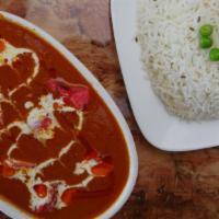 Butter Chicken · Boneless tandoori chicken simmered in a sauce of fresh tomatoes and creamy sauce.