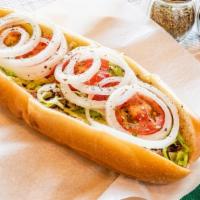 Cheesesteak Hoagie · Includes lettuce tomatoes and onions.