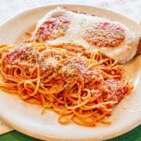 Chicken Parmigiana · Served with pasta, and choice of side.