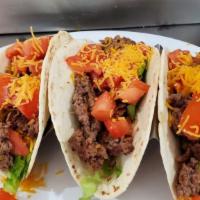 Taco'S · Three Soft Tortillas with tomato, onions, lettuce, cheddar, Salsa  and sour cream.  chicken ...