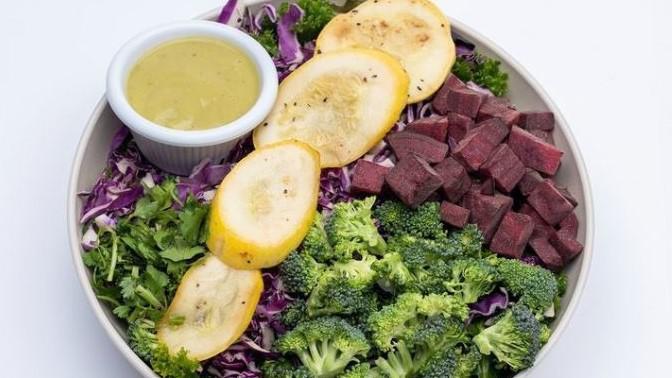 The Good Earth · Chopped kale, mixed greens, chopped broccoli, cooked beets, shredded red cabbage, grilled zucchini, and avocado dressing.
